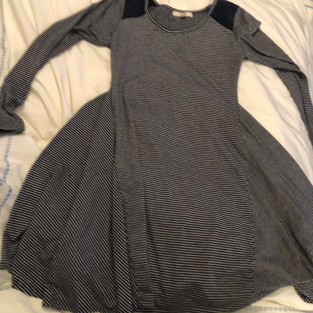 Long sleeved navy and white striped dress.